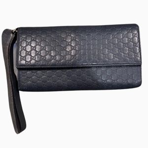 Gucci MicroGuccissima blue leather wristlet with travel document holders